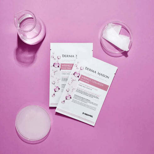 Bucurați-vă de beneficiile anti-îmbătrânire ale măștii faciale WRINKLE COLLAGEN FACIAL MASK de la DERMA MAISON. Acest produs esențial de frumusețe este realizat cu măiestrie cu o formulă puternică de colagen, prezentată pe un fundal violet vibrant, indicând proprietățile sale regenerative. Perfectă pentru diminuarea aspectului ridurilor, această mască hidratează și întărește, lăsând pielea revitalizată și netedă